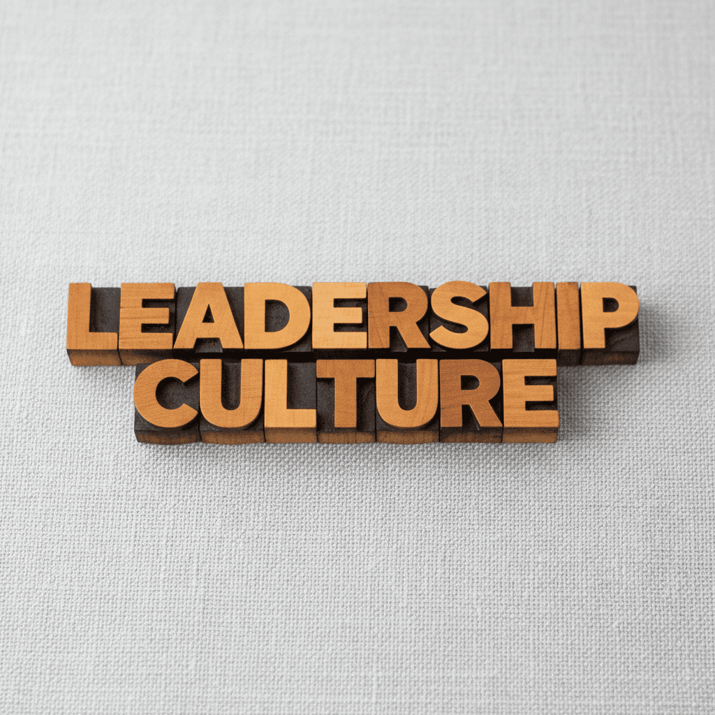 Leadership Culture spelled in wooden blocks on a neutral background